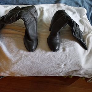 High heel black leather boots